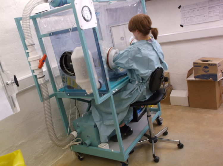 Medical volunteer in isolator during ebola outbreak