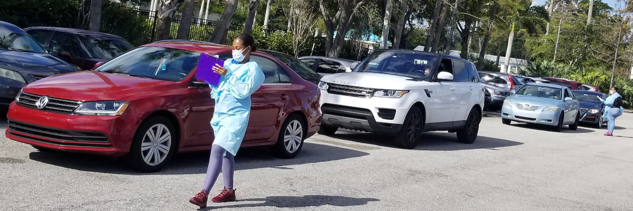 Florida Drive-Thru COVID-19 Testing Gets Off to Rocky Start Cars line up outside FoundCare, a community health center in West Palm Beach, Florida, for drive-thru COVID-19 testing Monday. (Phil Galewitz/KHN)