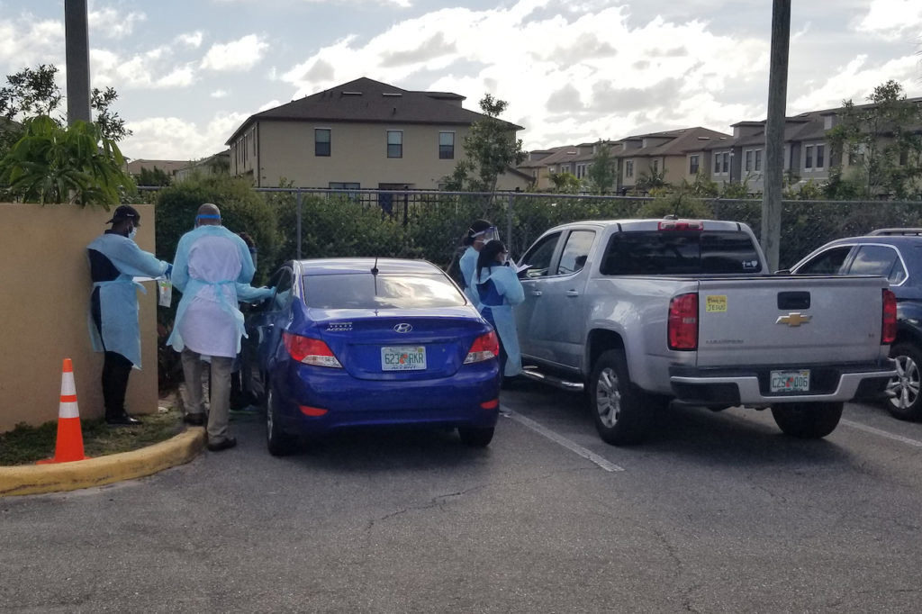 A drive-thru COVID-19 testing site opened Monday in West Palm Beach, Florida. But only 20 of dozens of visitors could get the test. (Phil Galewitz/KHN)