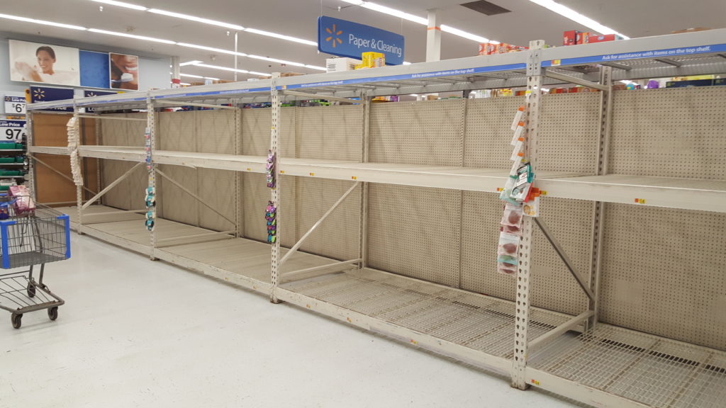 photo showing empty aisles at store during coronavirus (COVID-19) outbreak