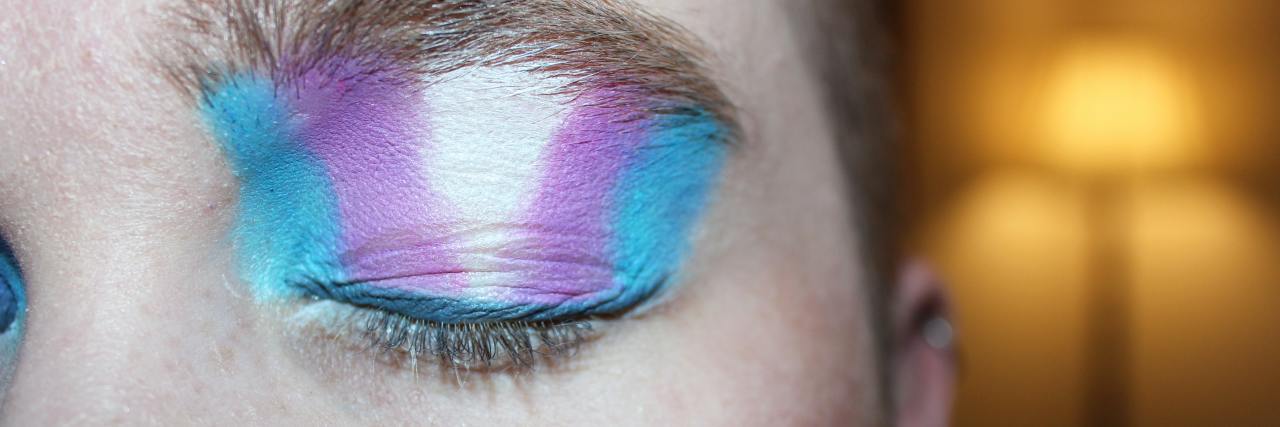 Gender Dysphoria When People Won't Look Past Appearance photo of person wearing trans flag eyeshadow