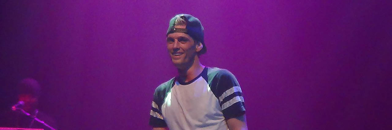 Aaron Carter Says He Has Schizophrenia, Multiple Personality Disorder Aaron Carter poses while onstage at one of his concerts