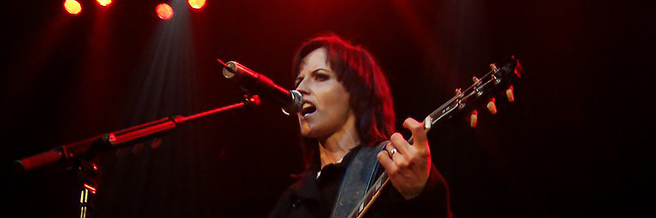 Dolores O'Riordan performing with The Crannberies