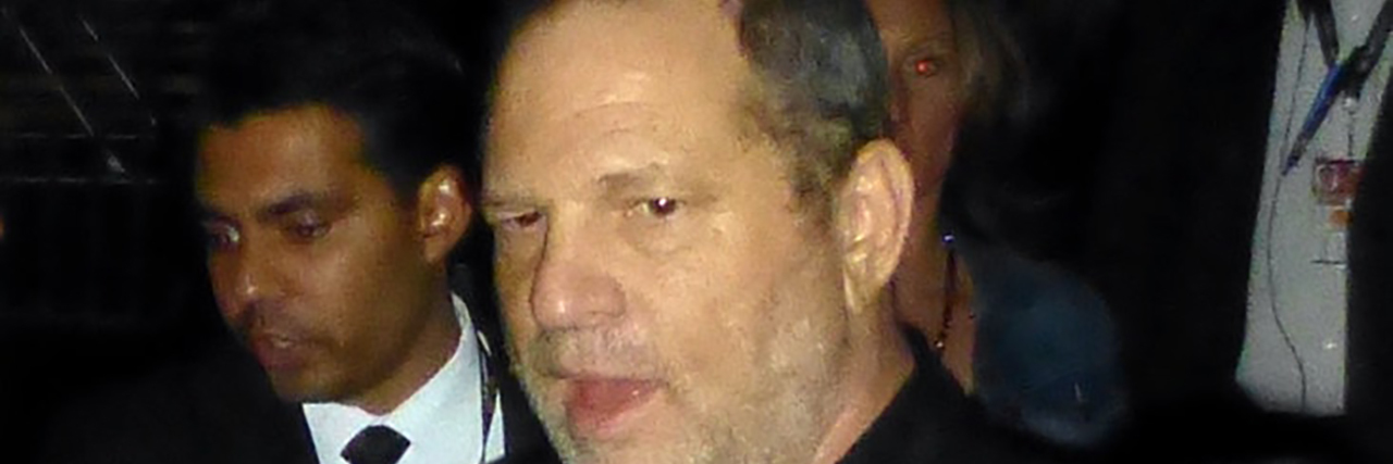 Harvey Weinstein Arrested, Charged With Rape Harvey Weinstein surrounded by a crowd