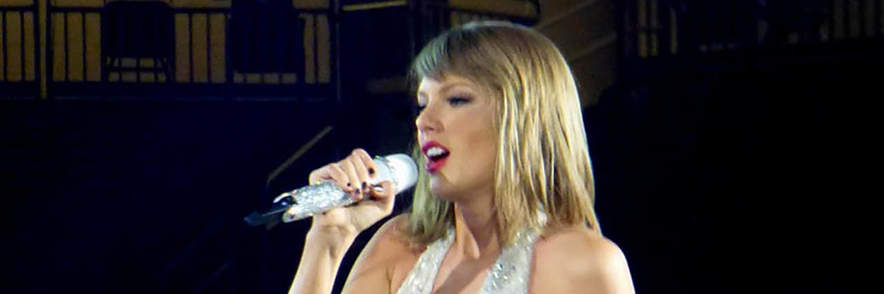 Taylor Swift Gives Speech One After Winning Sexual Assault Case Taylor Swift performs onstage while wearing a white ensemble