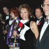 Mary Tyler Moore holding her Emmy Award