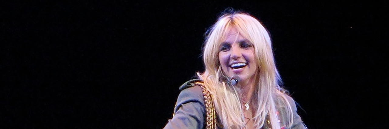 Britney Spears Reportedly Checks Herself Into Mental Health Facility Britney Spears poses during a concert.