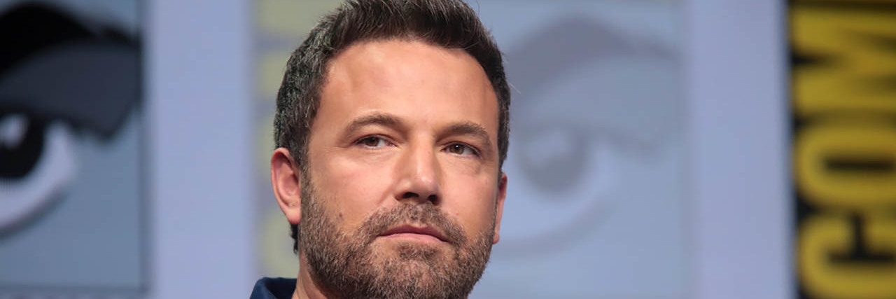 Ben Affleck sits while on a panel
