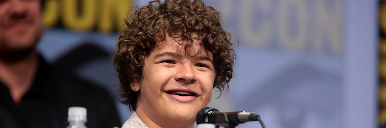 Study Shows 'Stranger Things' Increased Rare Disease Awareness Actor on Stranger Things talks in front of a panel
