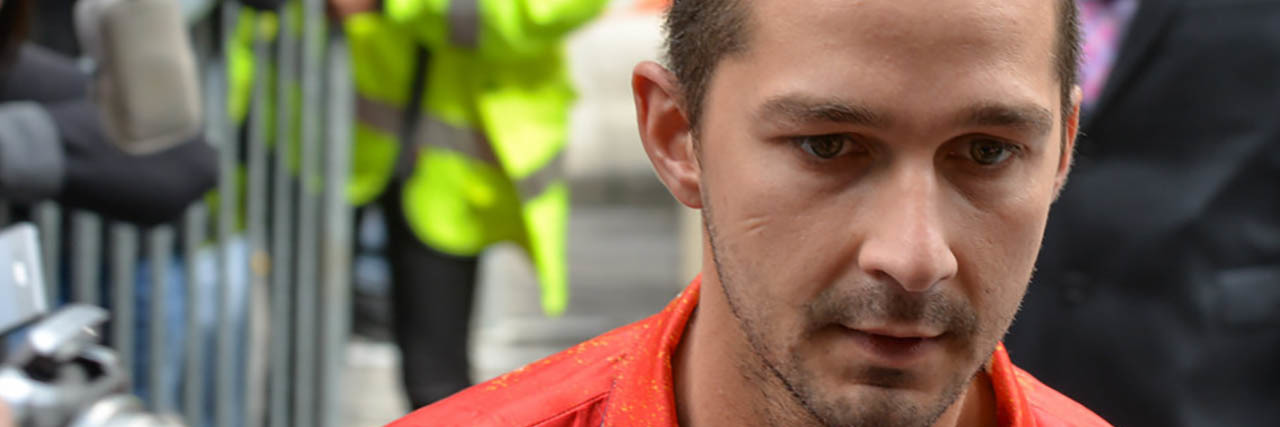 Shia LaBeouf Wrote 'Honey Boy' in Rehab Based on His Abusive Father A headshot of Shia Labouf on the red carpet