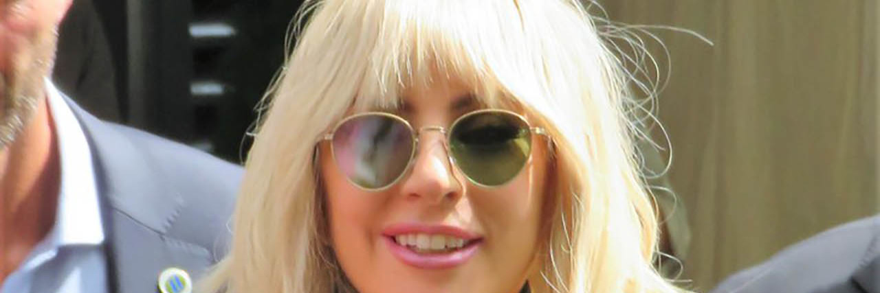 Lady Gaga Says Dunking Hands in Cold Water Can Calm Self-Harm Urges Lady Gaga wears a black jacket in front of a crowd