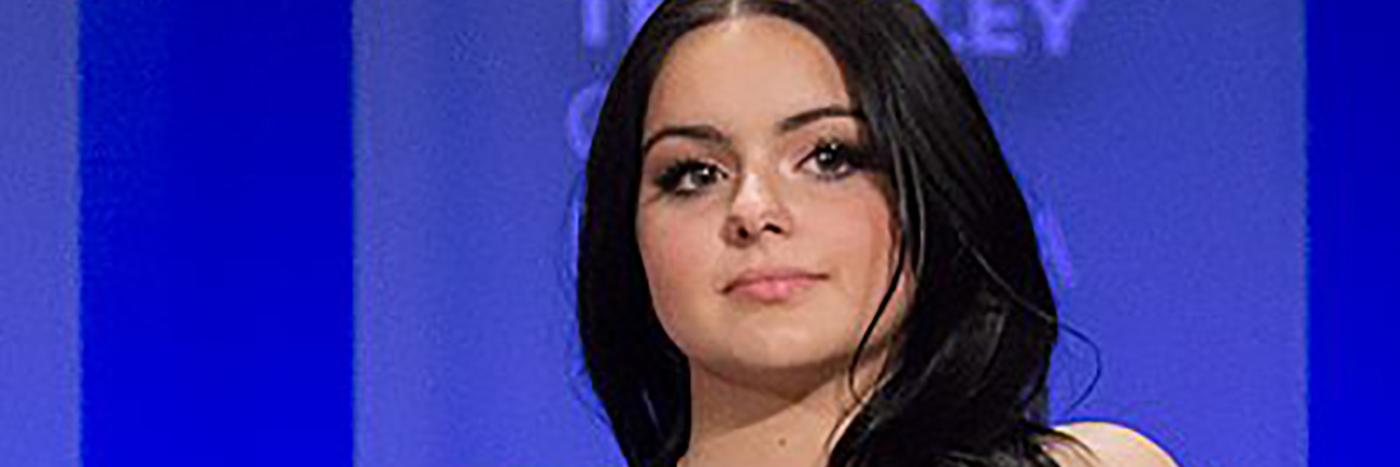 Crystal Workman Gives Interview Shaming Daughter Ariel Winter Clothing Ariel Winter wears a black dress while sitting on a panel
