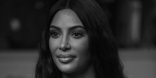 A black and white photo of Kim Kardashian