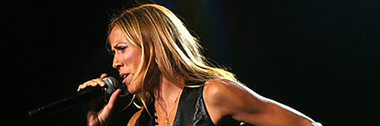 Sheryl Crow Shares Self-Care Lesson Breast Cancer Taught Her Sheryl Crow performing onstage