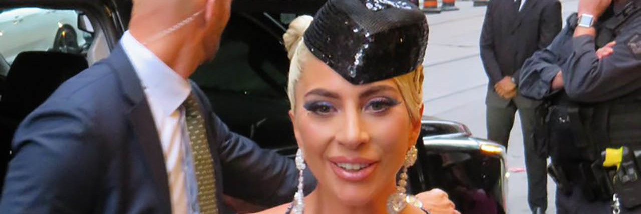 Lady Gaga wears a sparkly dress on the red carpet