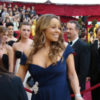 Mariah Carey smiles on the red carpet