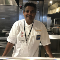 A photo of late Floyd Cardoz in the kitchen