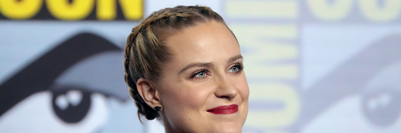 Evan Rachel Wood Tweets About Feeling Triggered by Sexual Assault News Evan Rachel Wood speaking at a panel at ComicCon