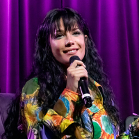 Halsey speaking at an event