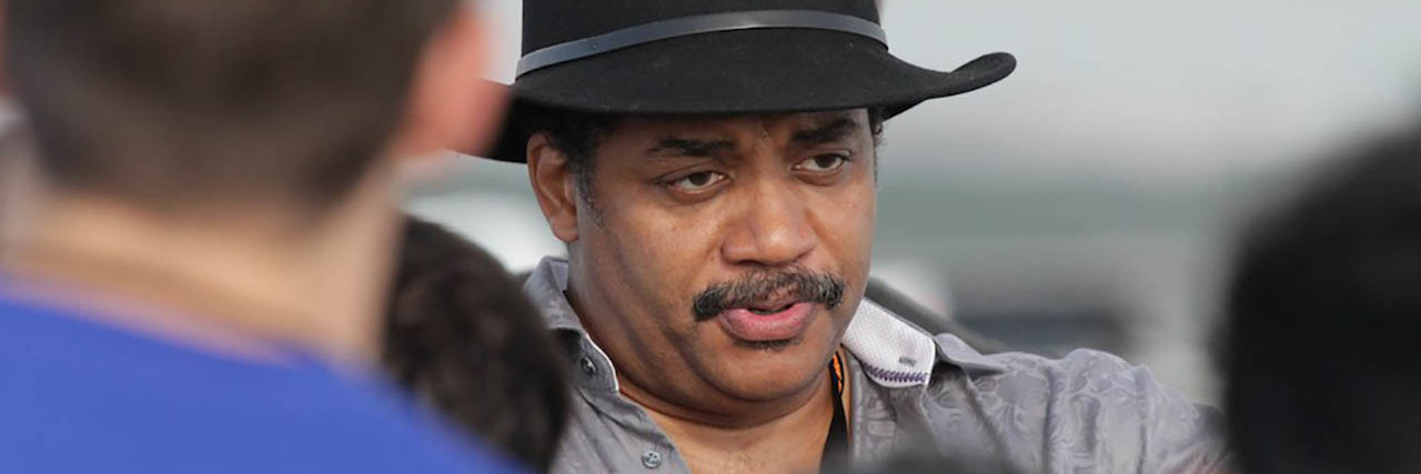 Neil DeGrasse Tyson speaks while on a panel