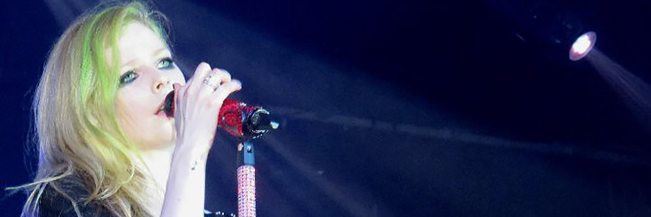 Avril Lavigne Released Her First Song in 2 Years for an Awesome Reason Avril Lavigne sings while wearing a black outfit