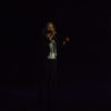Demi Lovato singing onstage