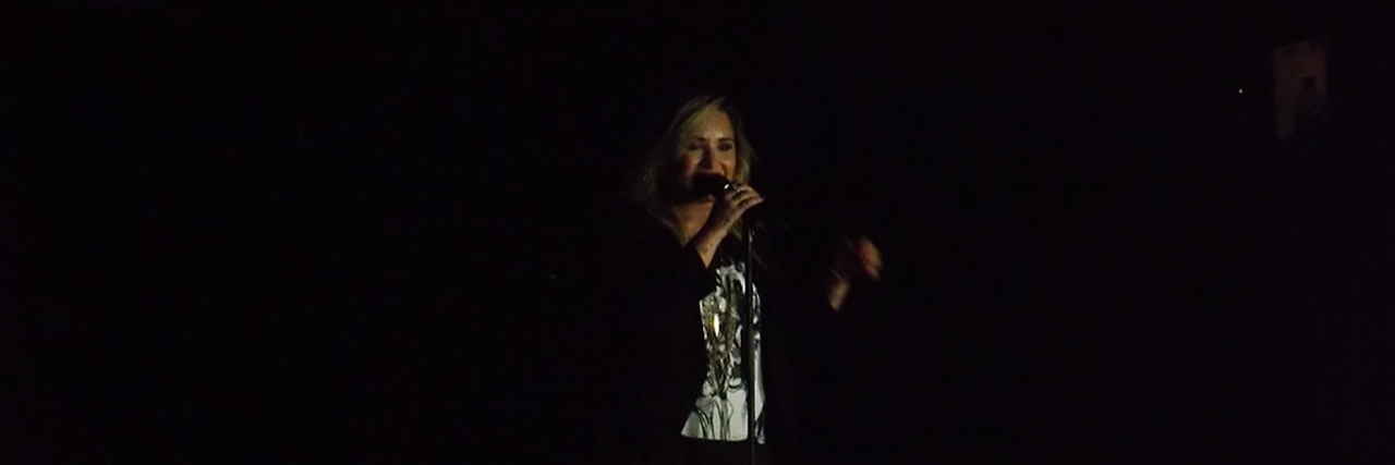 Demi Lovato Will Offer Therapy on 'Tell Me You Love' Me Concert Tour Demi Lovato singing onstage
