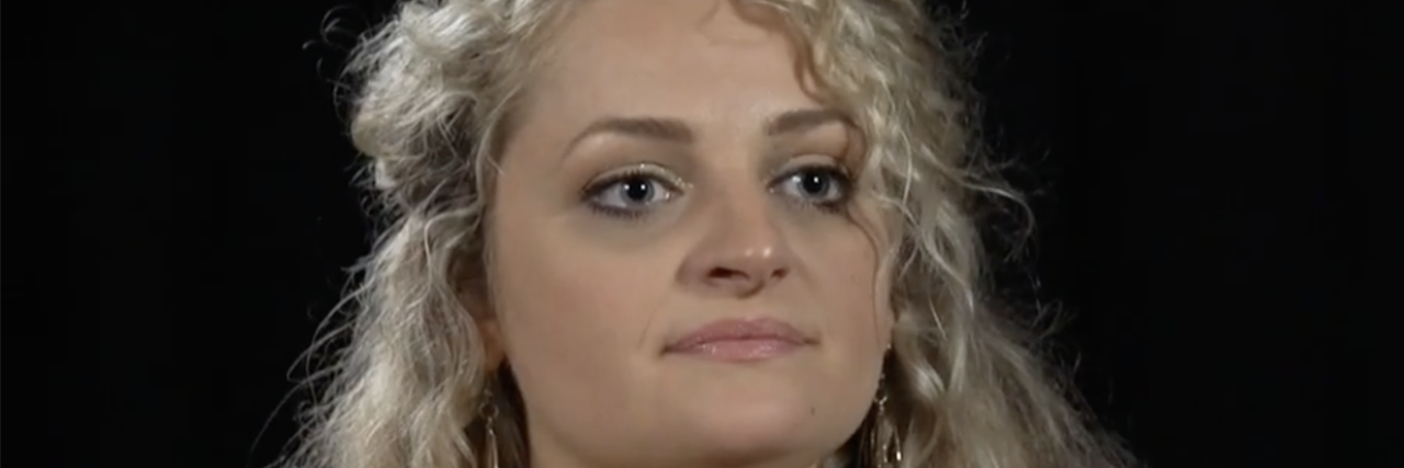 Ali Stroker Becomes First Wheelchair User to Win a Tony Award Ali Stroker looks ahead and wears a light teal shirt