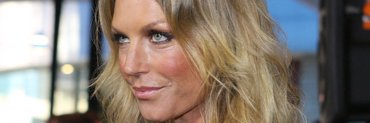 Australian Model Annalise Braakensiek Dead at 46 Annalise Braakensiek looks ahead while wearing a black outfit at an event