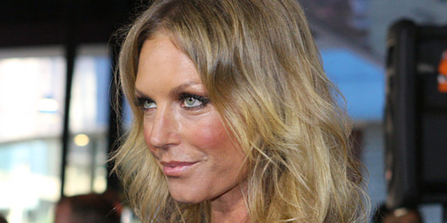 Annalise Braakensiek looks ahead while wearing a black outfit at an event
