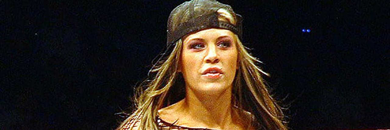 Former WWE Diva Superstar Ashley Massaro Dies by Apparent Suicide An action shot of Ashley Massaro in the wrestling ring