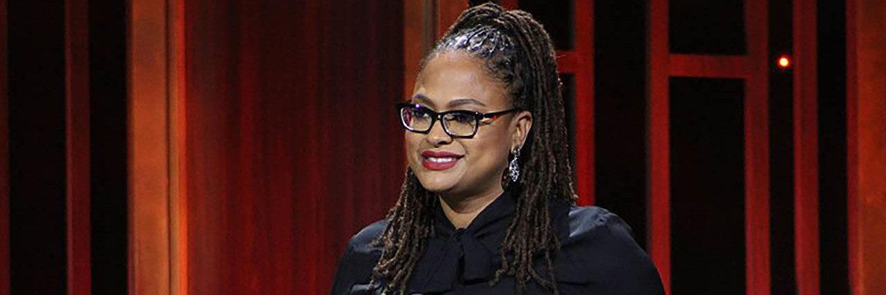 Ava DuVernay Reveals Lupus Diagnosis at Essence Festival Ava DuVernay wears a black ensemble while accepting a Peabody Award.