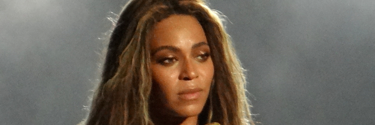 Beyoncé Talks Pregnancy and Recovery in September Vogue Cover Beyonce performs onstage in a light creme outfit