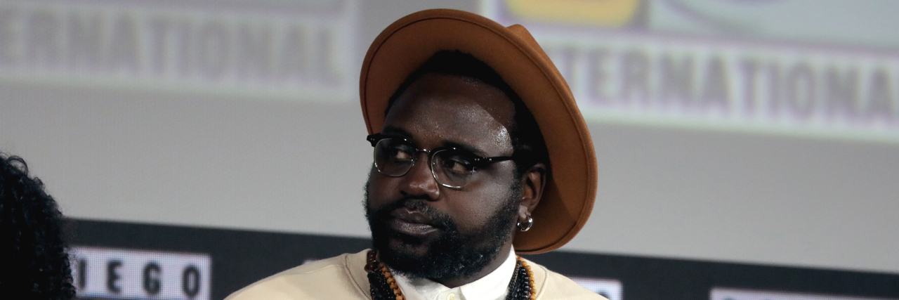 'Atlanta' Actor Brian Henry Talks Grieving His Mom's Unexpected Death Actor Brian Henry looks into the distance while on the red carpet