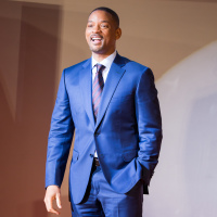 Will Smith in a blue suit on the red carpet