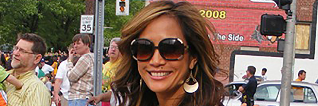 A photo of Carrie Ann Inaba posing while at the Kentucky Derby