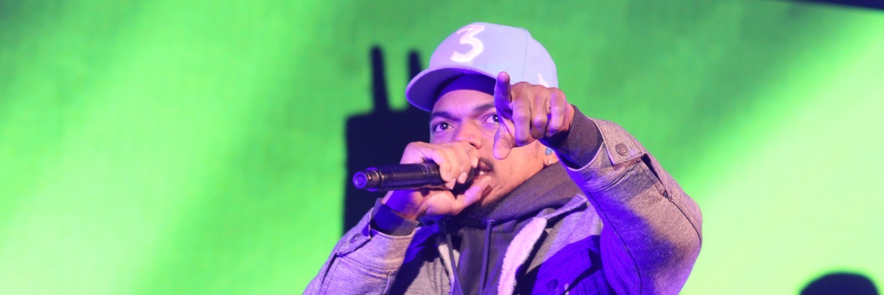 Chance the Rapper performing at a concert