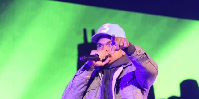 Chance the Rapper performing at a concert