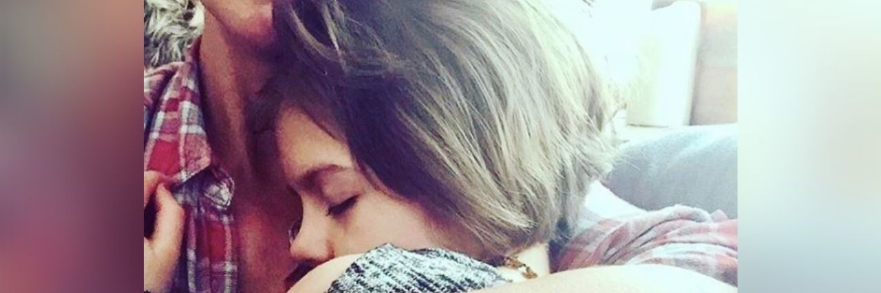 Charlotte Figi, Inspiration for Medical CBD, Dies at 13 from COVID-19 Charlotte Figi curled up in her parent's arms