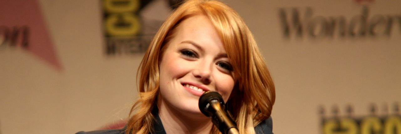 Jennifer Lawrence Asks Emma Stone About Anxiety in 'Elle' Interview Emma Stone smiles at the audience while on a panel.
