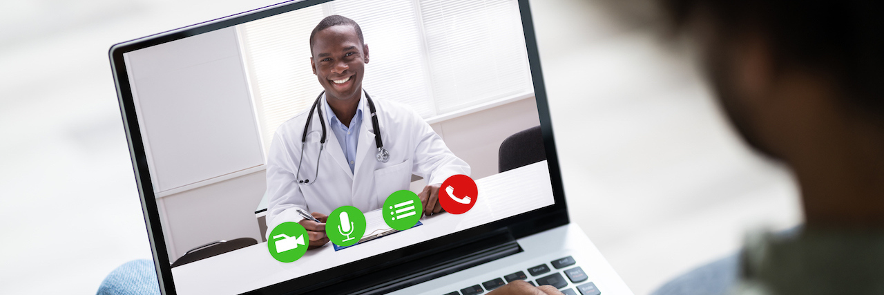 Patients Are Billed for Telehealth Despite Promises it Would Be Free Close-up Of A Man Using Laptop To Communicate With Doctor