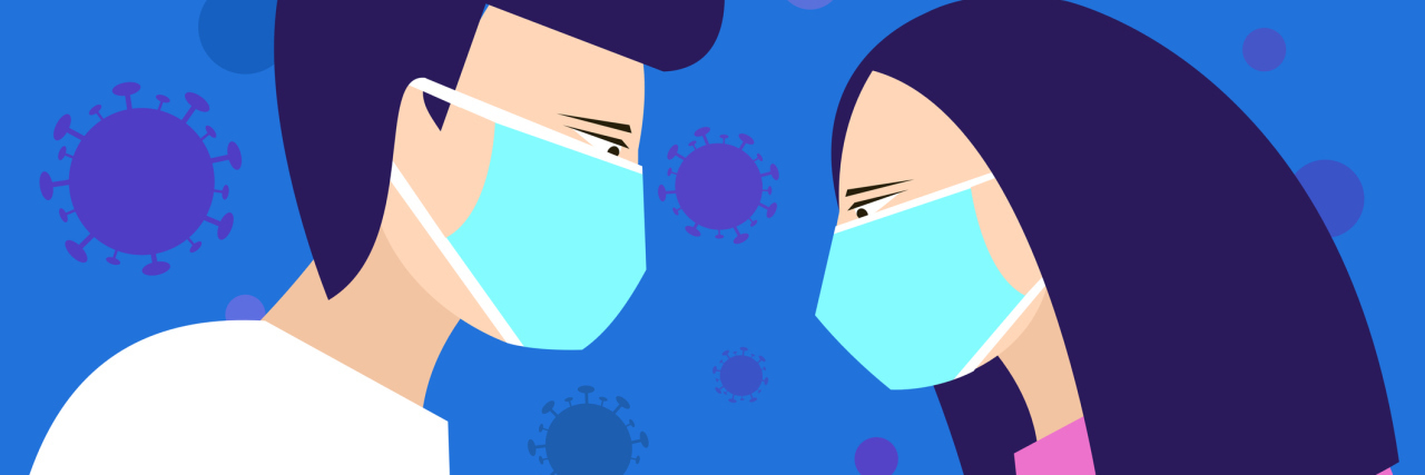 Couple wearing face mask to protect against Corona virus spread