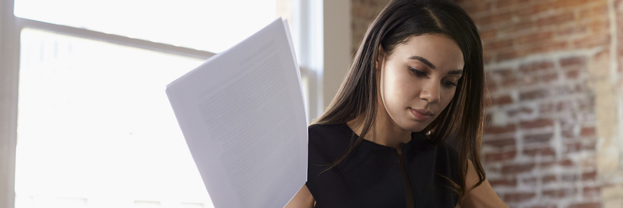 When Life With Chronic Illness Is Different But Great Businesswoman making notes on document