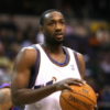 Gilbert Arenas holds a basketball during a game on court