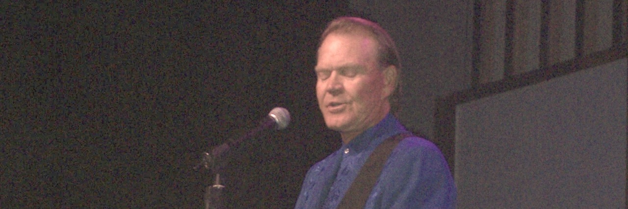 Glen Campbell performing onstage in Branson, Missouri