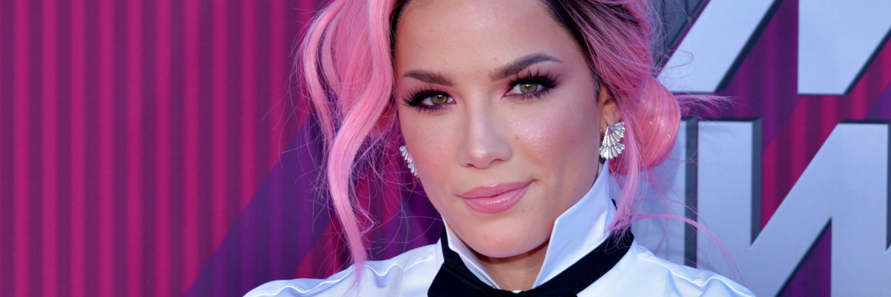 Halsey Perfectly Describes What's So Scary About Being 'That Sick Girl' Halsey posing on the red carpet
