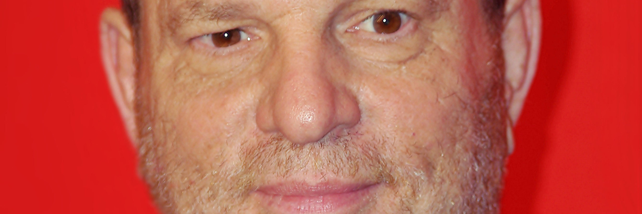 Harvey Weinstein looks ahead on a red carpet