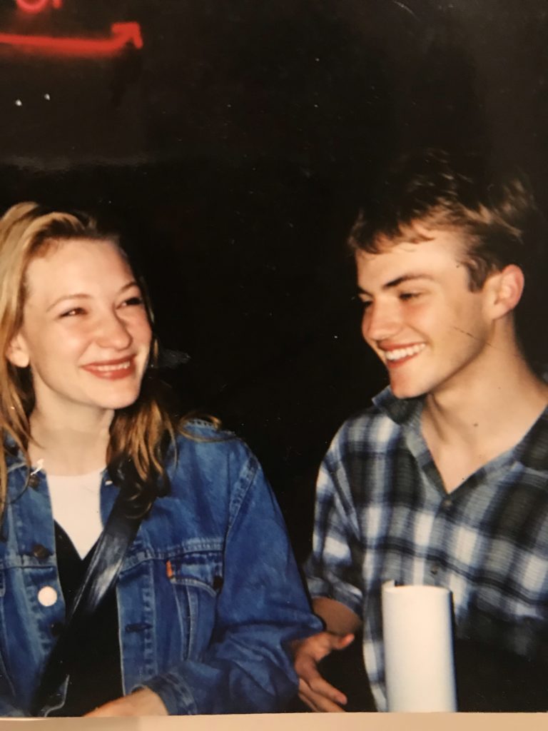 photo of contributor Andrew Lampe as a teenager posing with a smiling, young Cate Blanchett