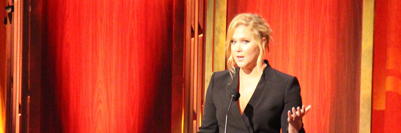 Amy Schumer accepted a Peabody Award in a black suit dress