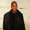 Jay-Z, dressed in black, at an event for his foundation